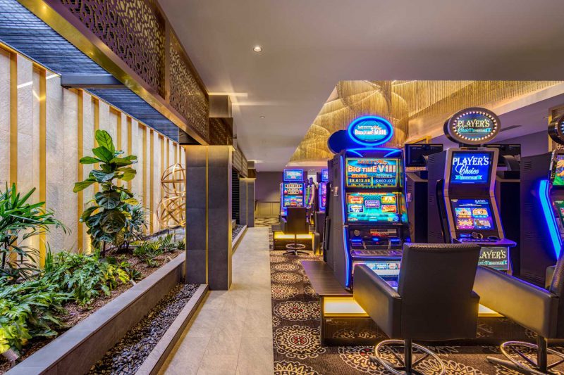 Indoor garden and gaming machines at the Gregory Hills Hotel, design by Paul Kelly Design