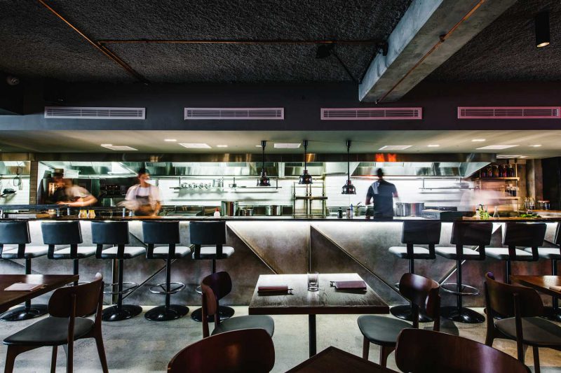 Interior view over kitchen at Salaryman, design by Paul Kelly Design