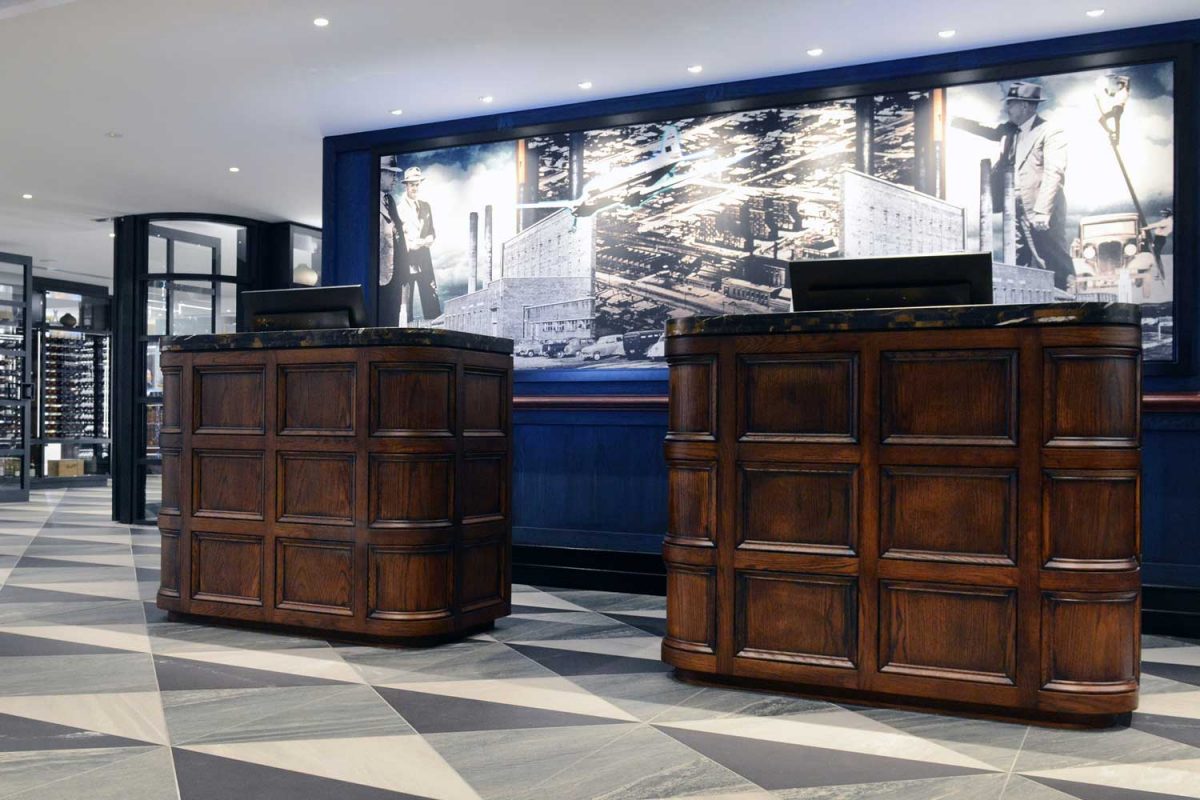 Alternative view of reception area showing custom mural artwork, design by Paul Kelly Design